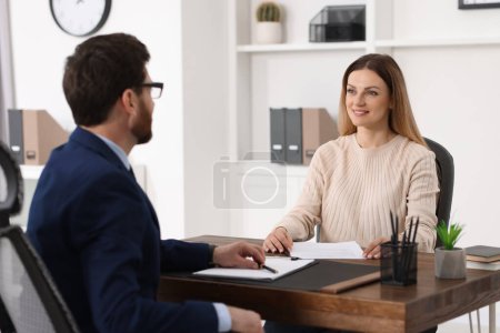 Photo for Woman having meeting with lawyer in office - Royalty Free Image