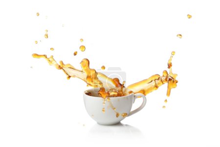 Coffee splashing in cup on white background