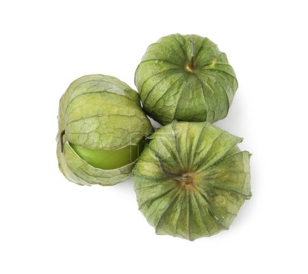 Fresh green tomatillos with husk isolated on white, top view