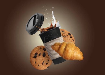 Photo for Cup of coffee, chocolate chip cookies and croissant flying on brown gradient background - Royalty Free Image