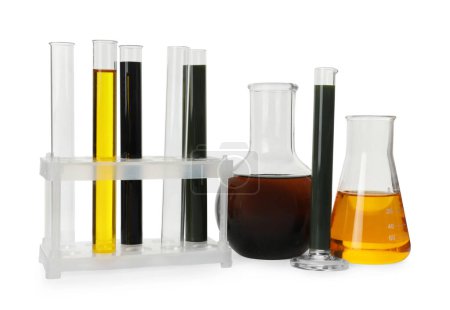 Photo for Laboratory glassware with different types of crude oil isolated on white - Royalty Free Image