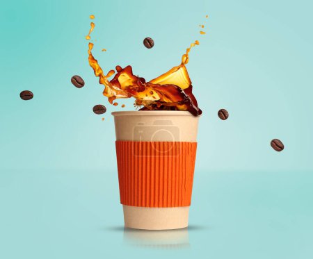 Photo for Aromatic coffee splashing in takeaway paper cup and flying roasted beans on turquoise background - Royalty Free Image