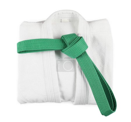 Martial arts uniform with green belt isolated on white, top view