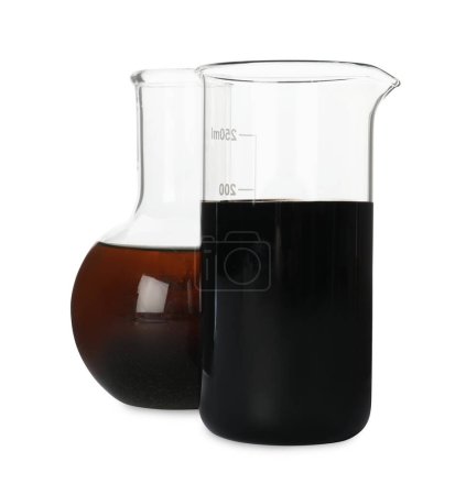 Photo for Beaker and flask with different types of crude oil isolated on white - Royalty Free Image