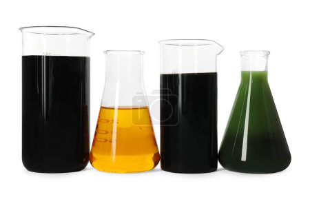Photo for Beakers and flasks with different types of oil isolated on white - Royalty Free Image