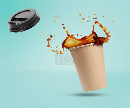 Photo for Aromatic coffee in takeaway paper cup in air on turquoise background - Royalty Free Image