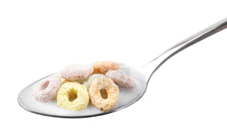 Photo for Cereal rings and milk in spoon isolated on white - Royalty Free Image
