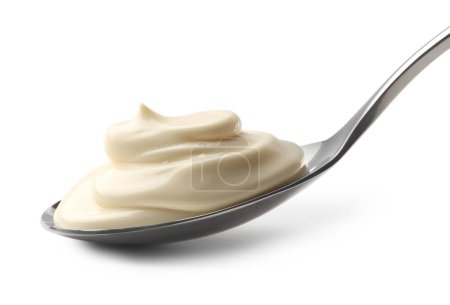 Yogur natural en cuchara aislado sobre blanco