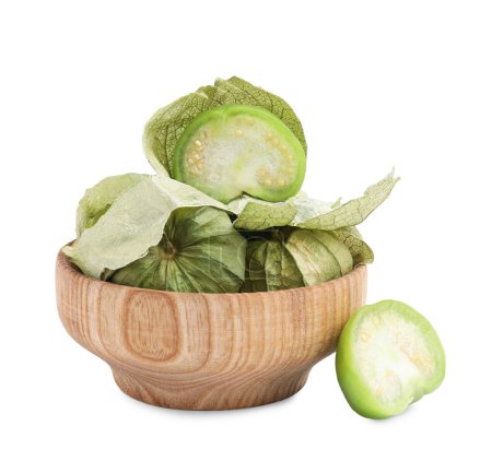 Fresh green tomatillos with husk in bowl isolated on white