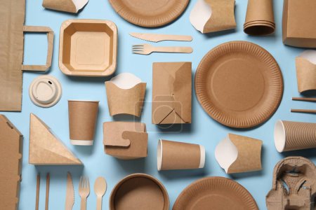 Flat lay composition with eco friendly food packagings on light blue background