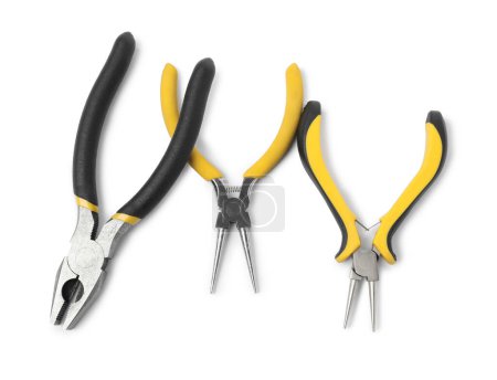 Photo for Group of different pliers isolated on white, top view - Royalty Free Image