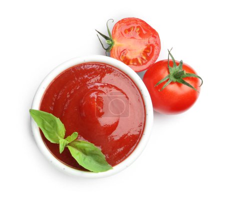 Photo for Tasty ketchup in bowl, basil and fresh tomatoes isolated on white, top view - Royalty Free Image