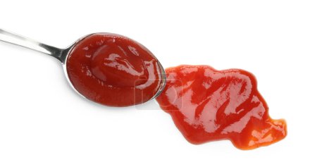 Photo for Tasty ketchup with spoon isolated on white, top view. Tomato sauce - Royalty Free Image