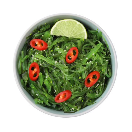 Tasty seaweed salad in bowl isolated on white, top view
