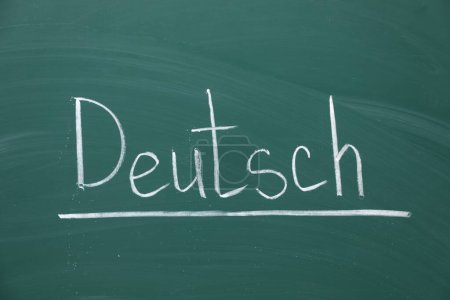 Word Deutsch written with chalk on green board