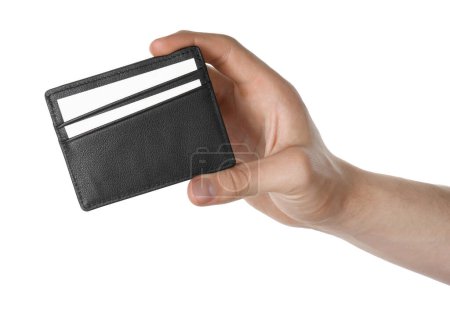 Man holding leather business card holder with cards on white background, closeup