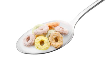 Photo for Cereal rings and milk in spoon isolated on white - Royalty Free Image