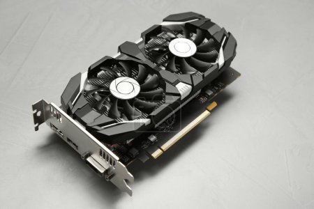 Computer graphics card on gray textured background