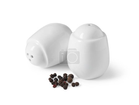 Salt and pepper shakers with grains isolated on white