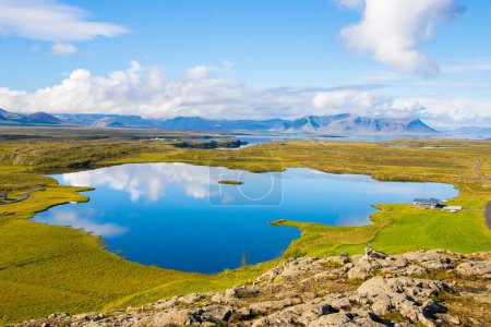 Photo for Green Landscape with Lake and Sky with Clouds Beautiful Helgafell, Iceland with Hills and Ocean - Royalty Free Image
