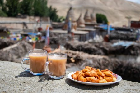 Photo for Tibetan Salt Ghee Tea and Khapse Deep Fried Doughnut Snack, a Himalayan Food in Nepal - Royalty Free Image
