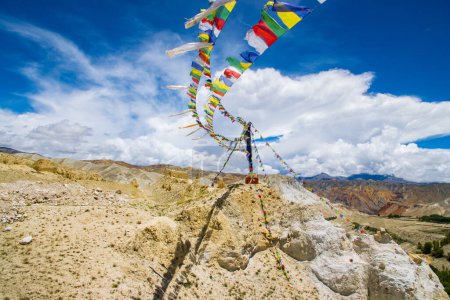 Photo for Prayer Flags Flying in the desert wind of Lo Manthang, Upper Mustang in the Himalayas of Nepal - Royalty Free Image
