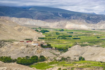 Photo for Namgyal Gompa Gumba Monastery in Upper Mustang of Tibetan Nepal with beautiful green desert - Royalty Free Image
