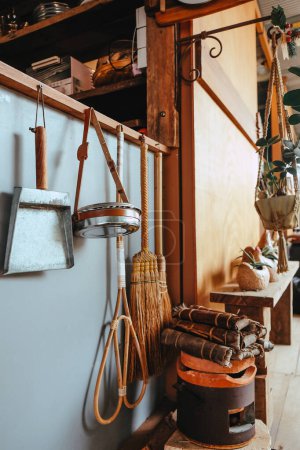 Photo for Image of Household utensils hanging on the wall in the kitchen. - Royalty Free Image