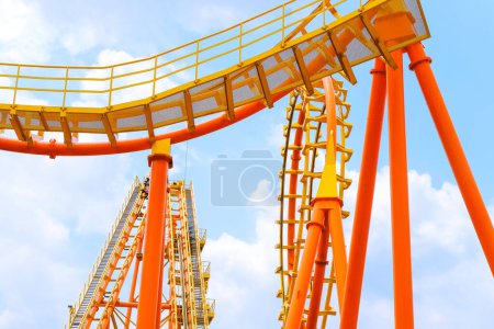 Photo for Close-up image of a roller coaster track and the blue sky - Royalty Free Image