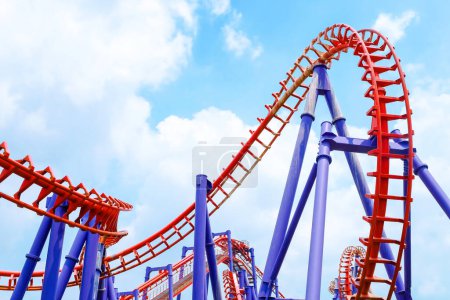 Photo for Close-up image of a roller coaster track and the blue sky - Royalty Free Image