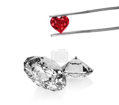 Photo for Excellent red heart cut diamonds held by tweezers and dazzling diamond on white background - Royalty Free Image