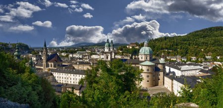 Salzburg, Austria, August 15 2022. Large format panoramic photo with the city seen from the top of the hill above it. Beautiful summer day.
