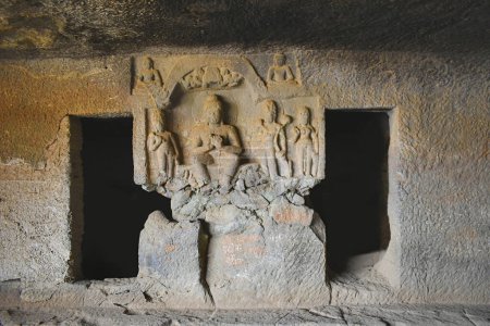Photo for A View of Lower unfinished Vihara, Intrusive Buddha panel and Cells for the Monks, Karla Caves, these Caves was constructed between 50 and 70 CE, and 120 CE, located near the Karla, Lonavala in Pune Dist. Maharashtra, India. - Royalty Free Image