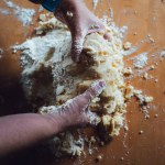 holding the dough in two hands