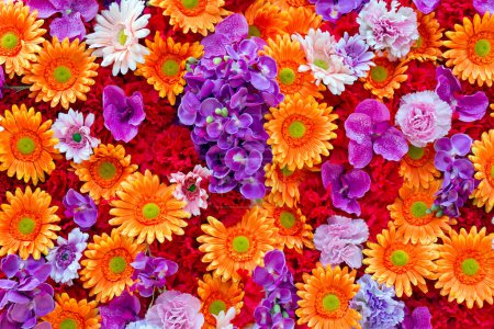 Colorful artificial flowers for the background.