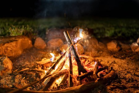 Photo for Campfire at night in mountains - Royalty Free Image