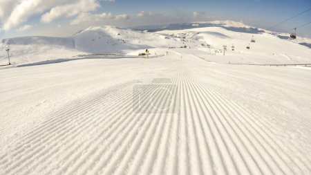 Photo for Fresh slopes in the morning, ready for winter sports - Royalty Free Image