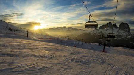 Photo for Slopes and chairlifts at sunset on selarona tour, Dolomites, Italy - Royalty Free Image