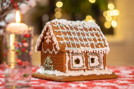 Beautiful gingerbread house on table. High quality photo