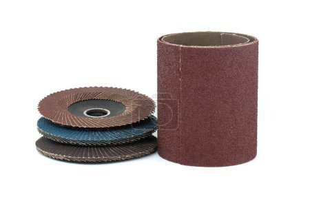 Photo for Several sanding discs and sandpaper in close-up view isolated on white background, typically used for grinding, sanding, and polishing in various industries - Royalty Free Image