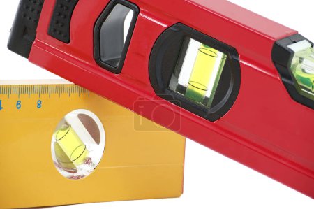 Red and yellow spirit level with a bubble indicator displayed against a white background