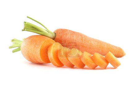 Whole carrot and sliced pieces, all with a bright orange color isolated on a white background