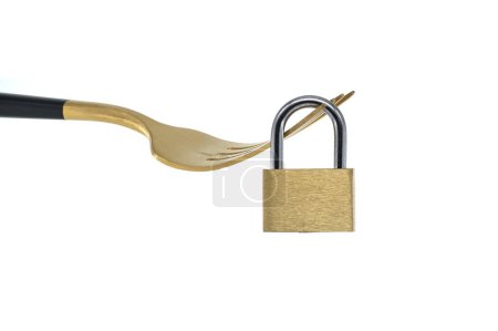 Fasting diet concept with gold fork and shiny gold padlock isolated on white background