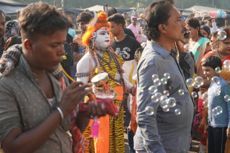 Photo for 31st October 2022, Kolkata, West Bengal, India. Spot lord Shiva Bahurupi at Huge Crowd in Babu Ghat - Royalty Free Image