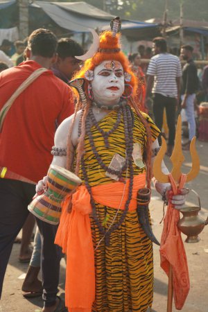Photo for 31st October 2022, Kolkata, West Bengal, India. Man makeup as Lord Shiva Bahurupi at Babu Ghat - Royalty Free Image