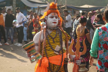 Photo for 31st October 2022, Kolkata, West Bengal, India. Bahurupi of Lord Shiva performing at Babu Ghat - Royalty Free Image