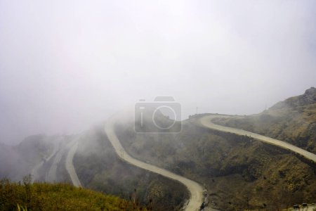 Photo for THE BEAUTIFUL ZIG ZAG ROAD WITH CLOUDY WEATHER IN SILK ROUTE SIKKIM - Royalty Free Image