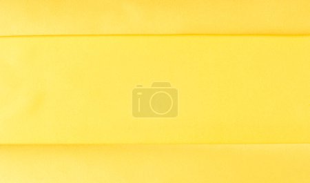 Photo for Background seamless texture - yellow silk. Premium silk organza in pale yellow is an exceptional fabric, beautiful both on its own and as an accessory in terms of highlighting. - Royalty Free Image