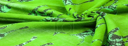 Foto de Ciervo silueta impresión tela de algodón verde, decoración moderna, arte textil, diseño, pintura futurista moderna. Textura, fondo, patrón - Imagen libre de derechos
