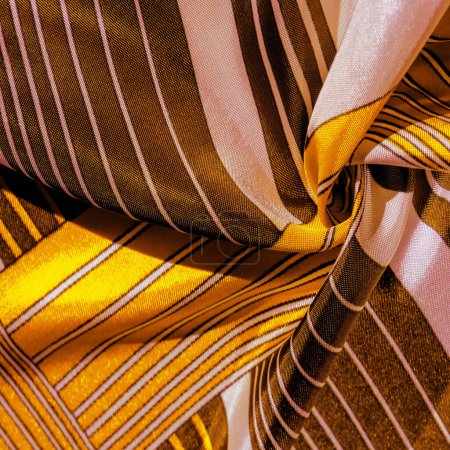 Photo for Silk fabric with yellow striped pattern. Poncho with Mexican motives. texture, background - Royalty Free Image